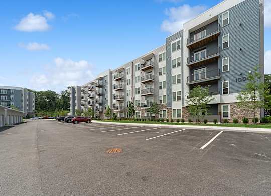 Exterior parking at The Quill Apartments in Milford MA