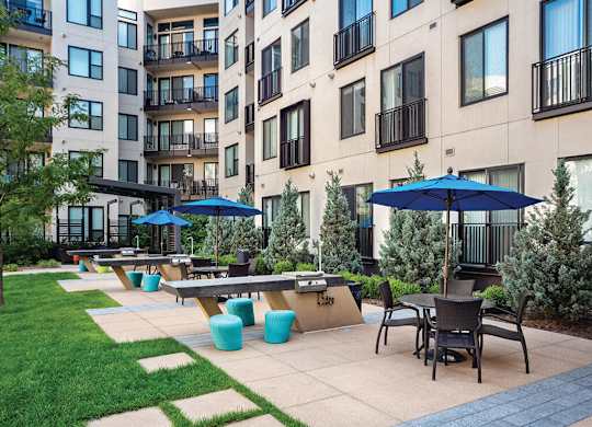 Exterior BBQ area at The Douglas Apartments in Denver