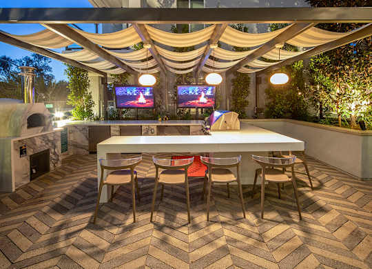 Exterior barbecue area at Rivair Apartment Homes in San Diego CA