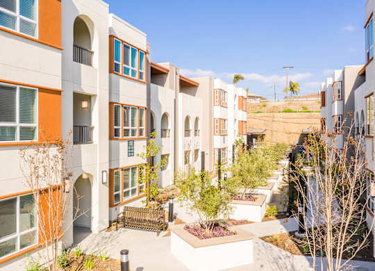 Exterior Building and Courtyard at The Seaton Apartments in San Diego CA