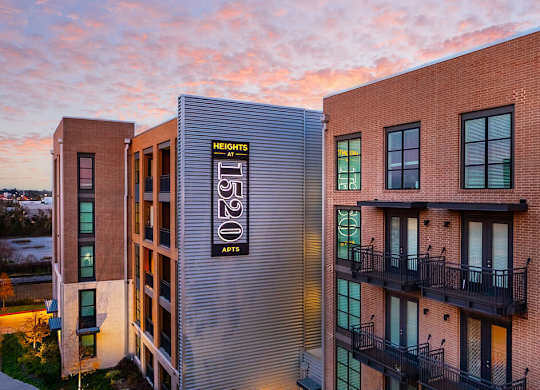 Exterior Building Dimmed at Heights at 1520 Apartments in Houston TX