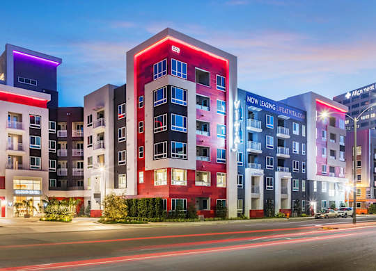 Exterior Building Garage Entry at Vita Apartment Homes in Orange CA