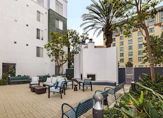 Courtyard and fireplace at Main and Jamboree Apartments in Irvine CA