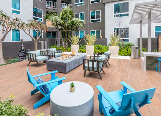 Exterior Courtyard Spark Fire Lounge and Seating at Avel Apartment Homes in Orange CA