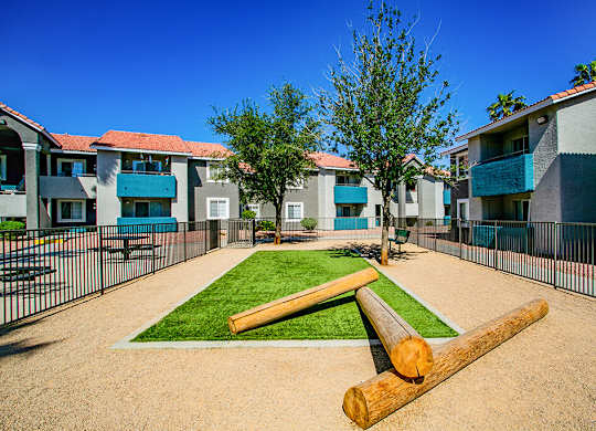 our apartments have a communal courtyard with a picnic table and grass