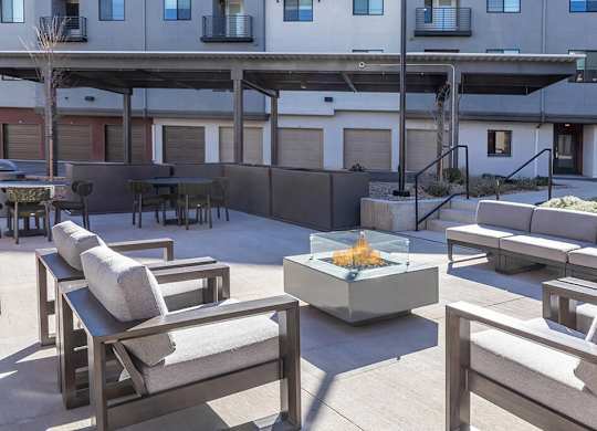 Exterior fire lounge courtyard at Olivean Apartments in Broomfield CO