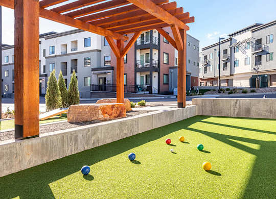 Outdoor game area at Olivean Apartments in Broomfield CO