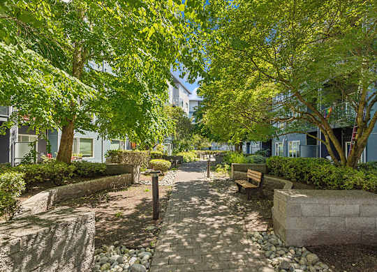 Walkway and benches at Riverpark Apartments in Redmond WA