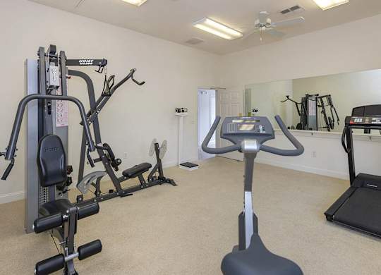 Fitness center at Whispering Oaks Apartments in Portsmouth VA