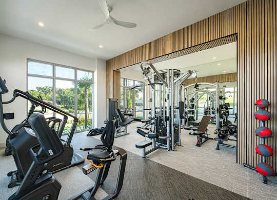 Fitness center with equipment at Treo Apartments in Fort Lauderdale FL