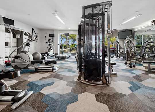 Fitness center at Axis Admiral Hill Apartments in Chelsea MA