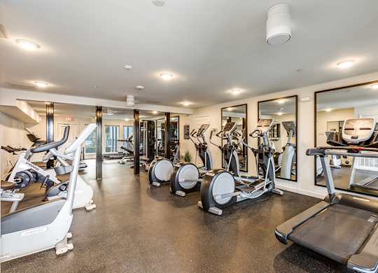 Fitness center cardio at Mission James Place Apartments in Austin TX
