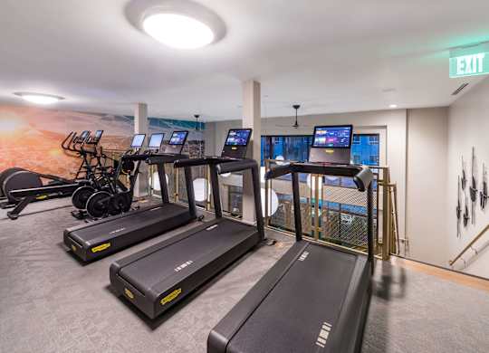 Fitness center treadmills at Avel Apartment Homes in Orange CA