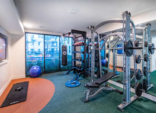 Fitness center weight machines at Bevel Apartments in San Diego CA
