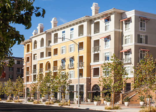 A large building with a lot of windows and balconies.