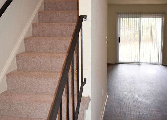 Townhome staircase at Whispering Oaks Apartments in Portsmouth VA