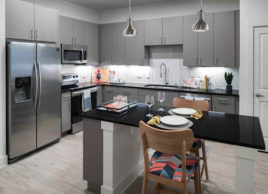 Kitchen island at Jada Legacy Central Apartments in Plano TX