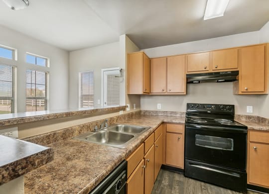 Kitchen with appliances at Sterling Green and Sheldon Ranch in Channelview TX