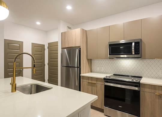 Kitchen with light cabinets at 333 Ellington Apartments in Gaithersburg MD