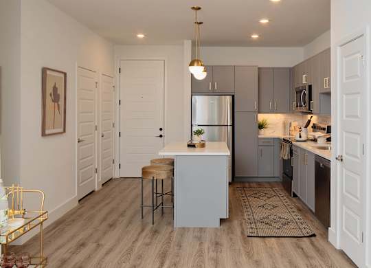 Kitchen in brass marble design at Wayfern Apartments in Sandy Springs GA