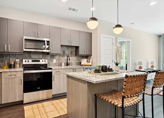 Kitchen island seating 2 at Verge Apartments in Atlanta GA