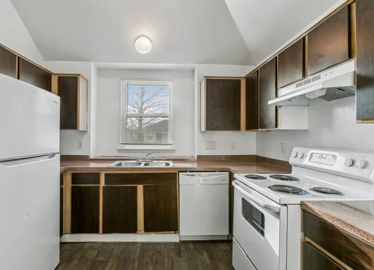 Kitchen with fridge and window at Sterling Green and Sheldon Ranch in Channelview TX