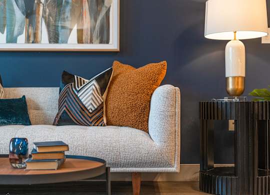 Kitchen sofa and table at VERO Apartments in Chelsea MA