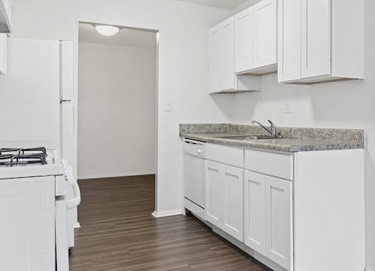 Kitchen with shaker cabinets at Oakfield Apartment Homes in Wheaton MD