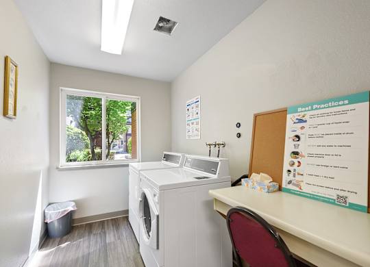Laundry Room at Auburn Court Apartments in Auburn WA