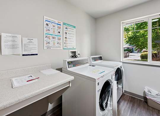 Laundry room at Lakewood Meadows Apartments in Lakewood WA
