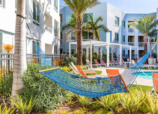 Poolside hammock at Bevel Apartments in San Diego CA