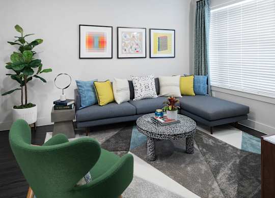 Living room seating at Jada Legacy Central Apartments in Plano TX