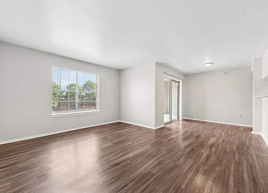 Living room and dining room at Valley Trails Apartments in Irving TX