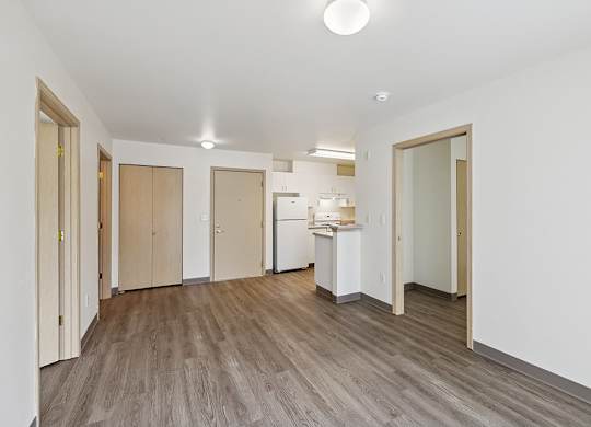 Living room and kitchen at Ballinger Court Senior Apartments in Edmonds WA