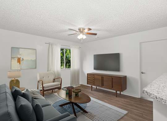 Living Room at Running Brook Apartments in Miami FL