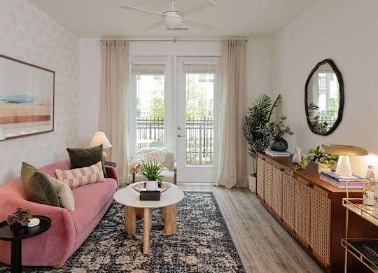 Living room in brass marble design at Wayfern Apartments in Sandy Springs GA