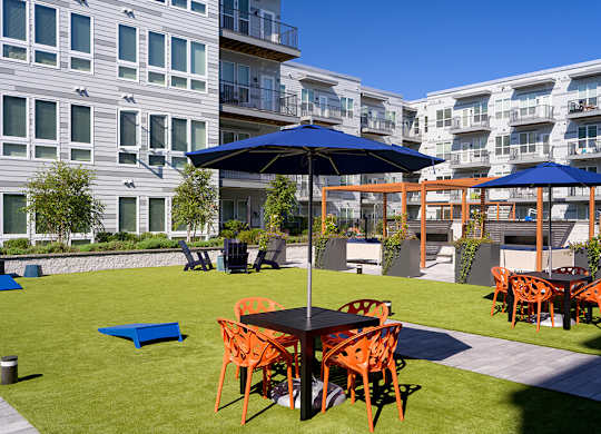 Lounge Seating and Cornhole at Vero Apartments in Chelsea MA