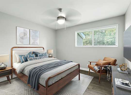 Bedroom with ceiling fan at City Side Flats Apartments in Nashville TN