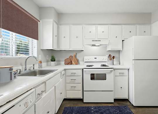 Kitchen with white cabinets at City Side Flats Apartments in Nashville TN