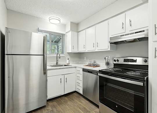 Kitchen with stove at City Side Flats Apartments in Nashville TN