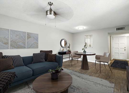 Living room with ceiling fan at City Side Flats Apartments in Nashville TN