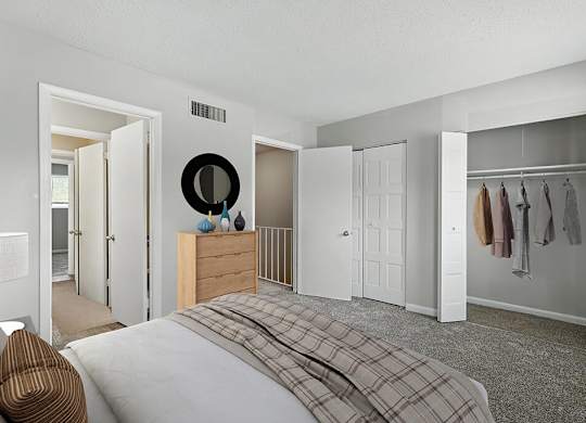 Primary bedroom with closet at City Side Flats Apartments in Nashville TN