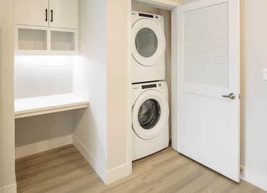 Built in desk and in unit laundry at CALIXA Apartment Homes in Camarillo CA