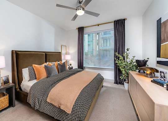 Bedroom in caviar scheme at Luca Apartments in Austin TX