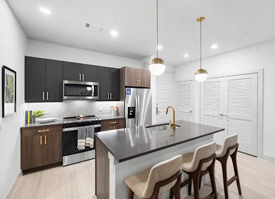 Model Concrete Design Package Kitchen Angled at East Bend Apartments in Houston TX