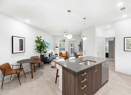 Model Concrete Design Package Kitchen Island at East Bend Apartments in Houston TX