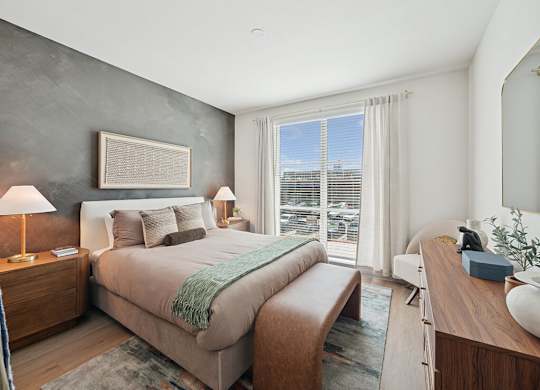 Bedroom with window at Heights at 1520 Apartments in Houston TX