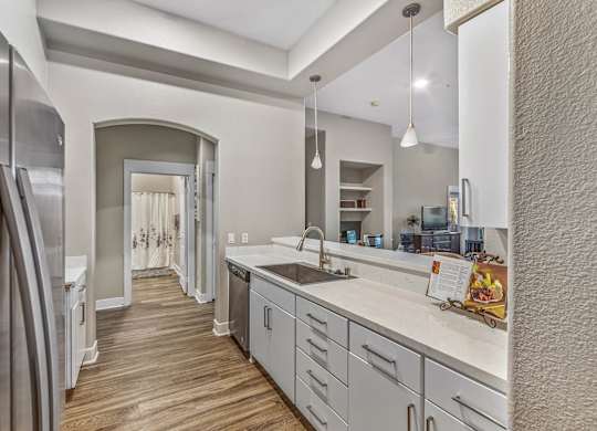 Model kitchen at Madison at Town Center Apartments in Santa Clarita CA