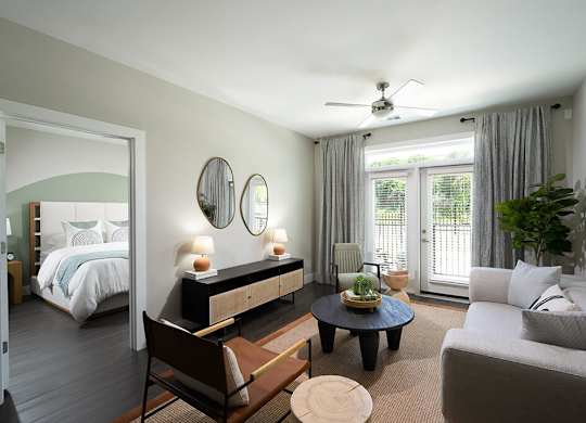 Living room with ceiling fan at Verge Apartments in Atlanta GA
