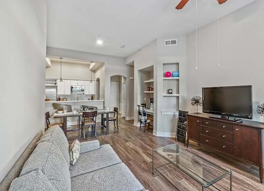 Living room and dining room at Madison at Town Center Apartments in Santa Clarita CA